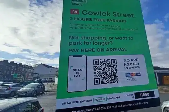 Parking sign with a QR code