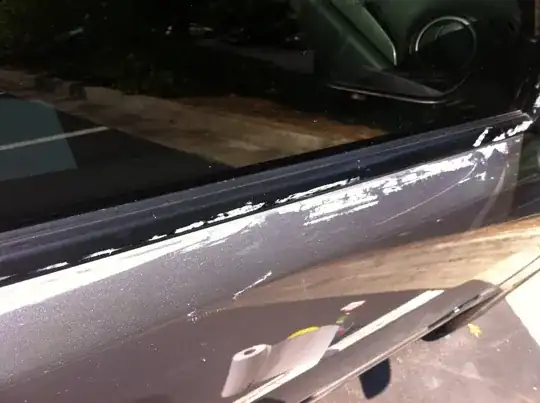 Showing duct tape residue on my car door.