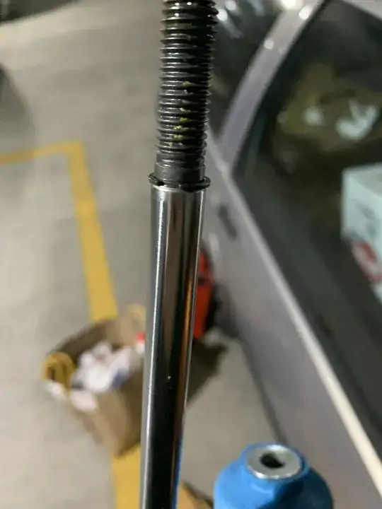 New shock rod with washer and dust cover removed
