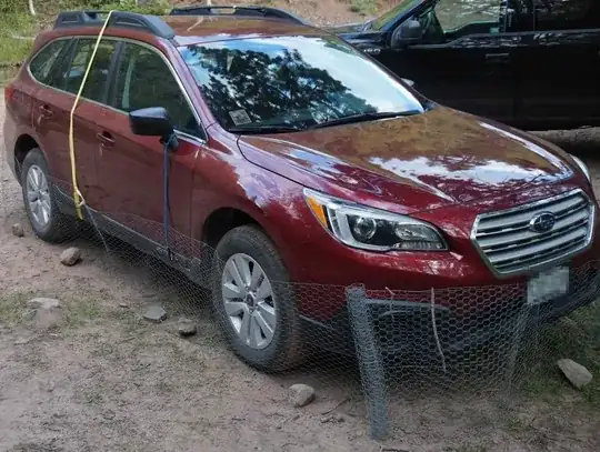 Vehicle with wire mesh surrounding it