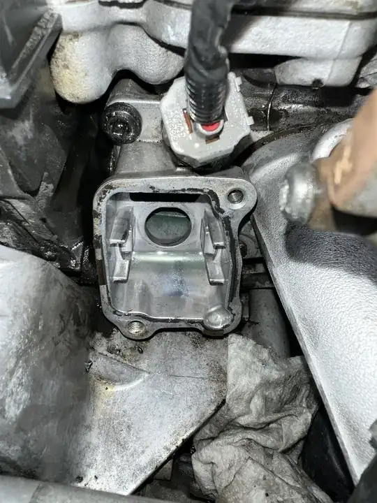 bottom thermostat housing still installed on the block