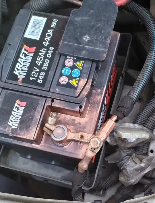 Red dust around the negative terminal