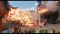 A librarian and a cleric running from the explosion