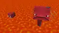 "A strider, standing in lava while looking up at the viewer."
