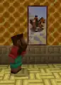 Noor looking at Prairie Ride. Unsurprisingly, Noor is seen in the painting.