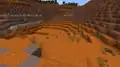 A badlands biome as seen from the ground.