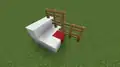 Mobs can jump onto this fence because of the red wool. Remove the red wool or replace the adjacent fence with a solid block.