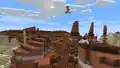 Sunny hopping across eroded badlands.