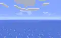 A frozen ocean biome, with fog obscuring the distance.