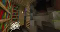A mineshaft has intersected with a stronghold resulting in floating ladders.