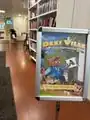 Sign promoting Dexi Ville at Kungsholmens Internationella Bibliotek.[7]