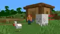 A ghastling following a chicken