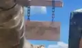 A hanging sign in A Minecraft Movie.
