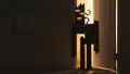 A creaking standing in a doorway.