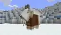 A goat in a coat.