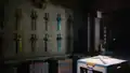 An array of swords to the left of the table.