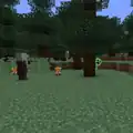 A creeper peeking out from a tree near a fox and a pillager.