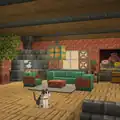 A third build, a living area with a cat.