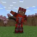 Noor wearing redstone silence trim on netherite armor.