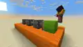 "Makena tinkering with a Redstone contraption made up of Pistons pushing a Lime Wool block."[8]