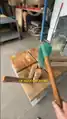Mumbo chopping wood.