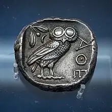 (photo of another instance of the Athenian tetradrachm, displaying owl)