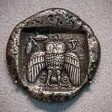 (photo of Athenian dekadrachm, displaying owl)