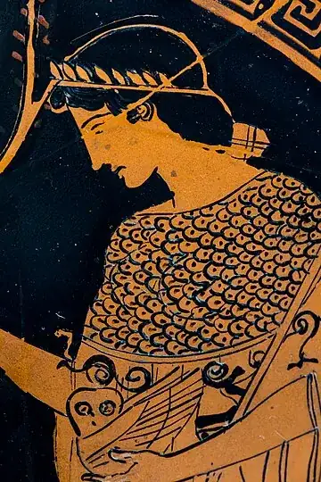 (detail photo of an ancient Greek vase, showing Athēnē holding an owl in her arm, a a bonus)