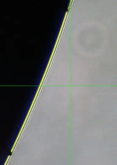 microscope image of ball bearing with difraction pattern