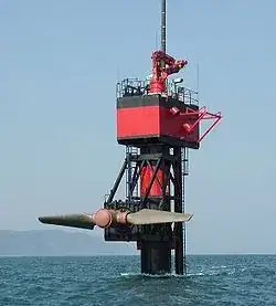 Seagen tidal turbine with blades raised above the water, from Wikimedia