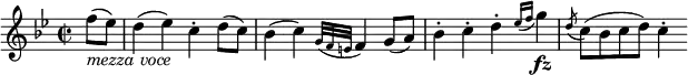 \relative f'' {
  \key bes \major \time 2/2
  \partial 4 f8( _\markup { \italic "mezza voce" } es)
  d4( es) c-. d8( c)
  bes4( c) \appoggiatura { g32 f e } f4 g8( a)
  bes4-. c-. d-. \appoggiatura { es16 f } g4 \fz
  \acciaccatura d8 c8( bes c d) c4-.
}