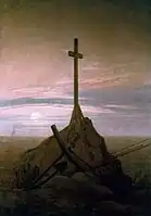 The Cross Beside The Baltic (1815), 45 × 33.5 cm. Schloss Charlottenburg, Berlin. This painting marked a move away from depictions in broad daylight, to return to nocturnal scenes, twilight and a deeper poignancy of mood.