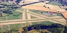 Derby Airfield in 2002, looking east along runway 10-28