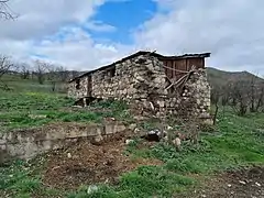 Destroyed house in the village