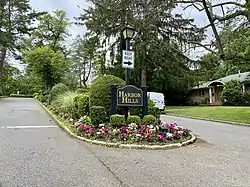 A welcome sign at an entrance to Harbor Hills on June 11, 2021.