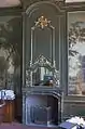 Fireplace in the parlour, flanked by Moucheron wall paintings