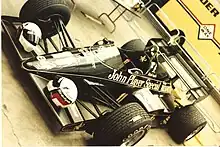 Lotus 95T in the garages of the 1984 Detroit Grand Prix