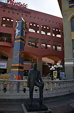 Statue of Ernest W. Hahn and Lyceum Theatre obelisk, near main entrance (2016)