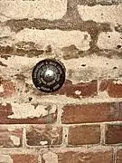 NPS Survey marker on the wall (towpath side) of the tunnel