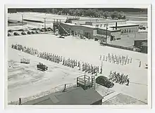 Photograph of mechanics going to work, Bainbridge Army Airfield, 1944