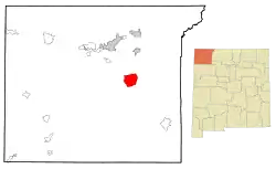 Location of Huerfano, New Mexico