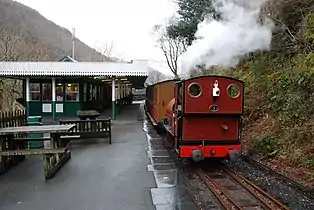 A train in Abergynolwyn station, looking east, 29 December 2009 The newest station, with its western extension, is visible on the left.