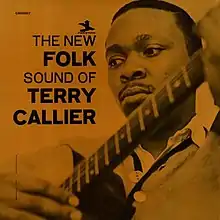 A deeply-colored sepia photo of Callier with an acoustic guitar