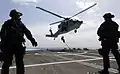 U.S. Coast Guard's MSST fast-ropes onto the flight deck of USS Freedom (LCS 1)