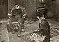 Still for the Exhibitors Herald showing a scene with Olga Grey, William Russell, and Lule Warrenton