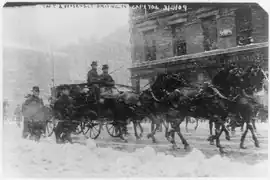 Presidents Taft and Roosevelt driving to Capitol