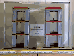 Concurrent shake-table testing of two building models.