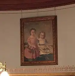 A painting of two little girls