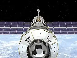 ISS Zvezda service module with docked Progress M1-3 spacecraft. Credit: NASA.{{free media}}